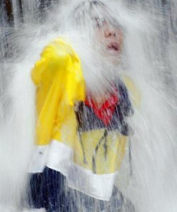 Swimming in hiking poncho